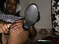 Black MILF gets wild with eggplant and squirts all over