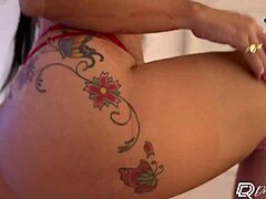 Tattooed hunk and curvy MILF engage in intense bareback sex