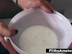 A filthy milf enjoys a retro milk fetish scene