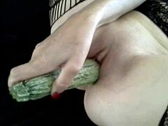 Blonde MILF gets kinky with cucumber and zucchini in pussy and ass