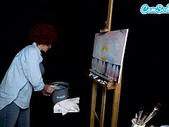 Ryan Keelys cosplay som Bob Ross får hende ophidset under en maleri tutorial på webcam