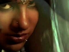 Busty Indian MILF gets naughty on the dance floor in softcore video