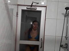 Sensual milf shows off her wet feet as she takes a dip in the sauna